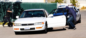 Richmond police officer Michael Brown, left, and detective Mauricio Canelo participate in a car stop exercise where Brown and Canelo, as the civilian